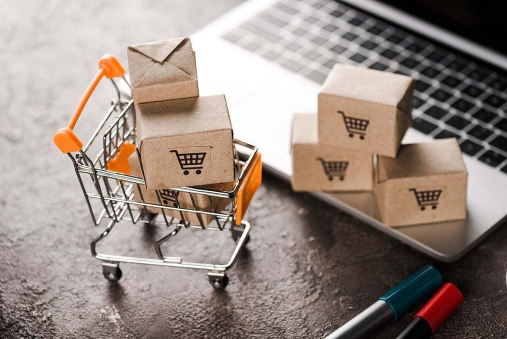 Selective Focus Of Toy Shopping Cart With Small Carton Boxes Nea Selective focus of toy shopping cart with small carton boxes nea
